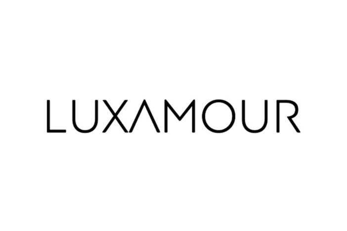 Elegant typography of the brand name 'luxamour' in a simple and sophisticated black font on a white background, epitomizing luxury lifestyle.